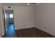 Bright bedroom with wood-look floors and ceiling fan at 2020 N World Parkway Blvd # 12, Clearwater, FL 33755