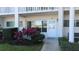 Unit entrance with walkway and nicely landscaped area at 2020 N World Parkway Blvd # 12, Clearwater, FL 33755