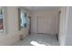 Spacious Florida room with tile floors and large windows at 2020 N World Parkway Blvd # 12, Clearwater, FL 33755