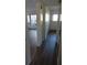 Clean hallway with wood-look floors at 2020 N World Parkway Blvd # 12, Clearwater, FL 33755