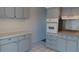 Bright kitchen featuring built-in oven and ample cabinetry at 2020 N World Parkway Blvd # 12, Clearwater, FL 33755