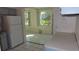 Kitchen with view into a breakfast nook and backyard at 2020 N World Parkway Blvd # 12, Clearwater, FL 33755