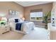 Spacious bedroom with water views and ample light at 20292 Sea Glass Cir, Land O Lakes, FL 34638