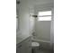 Bathroom with bathtub, toilet and white vanity at 2202 Clubhouse Dr # 173, Sun City Center, FL 33573