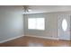 Bright and airy living room with hardwood floors and large window at 2202 Clubhouse Dr # 173, Sun City Center, FL 33573