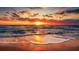 Stunning sunset over the ocean with waves gently lapping the shore at 2202 Clubhouse Dr # 173, Sun City Center, FL 33573