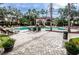 Inviting pool area with lounge chairs and landscaping at 2254 Chianti Pl # 68, Palm Harbor, FL 34683