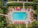 Relaxing rectangular pool with surrounding lounge chairs at 2254 Chianti Pl # 68, Palm Harbor, FL 34683