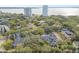 Aerial view of townhouses and pool, near water at 2519 Crowder Ln, Tampa, FL 33629