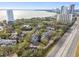 Aerial view showing townhouses and a nearby highway and waterfront at 2519 Crowder Ln, Tampa, FL 33629