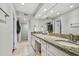 Bright bathroom with double vanity and granite countertop at 2519 Crowder Ln, Tampa, FL 33629