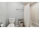 Clean bathroom with shower/tub combo and white tile at 2519 Crowder Ln, Tampa, FL 33629