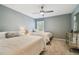 Bedroom with two twin beds and ceiling fan at 2519 Crowder Ln, Tampa, FL 33629