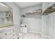 Walk-in closet with shelving and hanging rods at 2519 Crowder Ln, Tampa, FL 33629