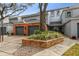 Inviting exterior of a two-story townhome with a brick facade and landscaped front yard at 2519 Crowder Ln, Tampa, FL 33629