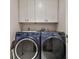 A bright laundry room with new washer and dryer at 2519 Crowder Ln, Tampa, FL 33629