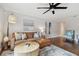 Living room with brown leather sectional and wood coffee table at 2519 Crowder Ln, Tampa, FL 33629