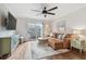 Comfortable living room with leather couch and hardwood floors at 2519 Crowder Ln, Tampa, FL 33629