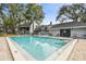 Refreshing community pool with steps and patio at 2519 Crowder Ln, Tampa, FL 33629