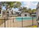 Community pool with brick patio and surrounding fence at 2519 Crowder Ln, Tampa, FL 33629