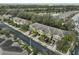 Aerial view of townhouses, street, and nearby lake at 2803 Santego Bay Ct, Brandon, FL 33511