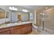 Double vanity bathroom with a large shower and toilet at 2803 Santego Bay Ct, Brandon, FL 33511