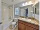 Bathroom features a shower/tub combo, toilet and vanity with granite countertop at 2803 Santego Bay Ct, Brandon, FL 33511