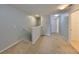 Upstairs hallway with carpeted floors and access to bedrooms and bathroom at 2803 Santego Bay Ct, Brandon, FL 33511