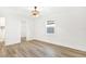 Spacious bedroom featuring a ceiling fan and large window at 2905 W Collins St, Tampa, FL 33607