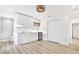 White kitchen with quartz countertops and a mini-fridge at 2905 W Collins St, Tampa, FL 33607