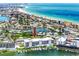 Aerial view showcasing building's waterfront location and marina at 300 150Th Ave # 502, Madeira Beach, FL 33708