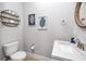 Stylish bathroom with modern vanity and floating shelves at 300 150Th Ave # 502, Madeira Beach, FL 33708