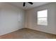 Simple bedroom with window, closet, and carpet at 30755 Summer Sun Loop, Wesley Chapel, FL 33545