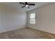 Bright bedroom with ceiling fan and window blinds at 30755 Summer Sun Loop, Wesley Chapel, FL 33545