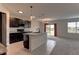 Modern kitchen with island and stainless steel appliances at 30755 Summer Sun Loop, Wesley Chapel, FL 33545