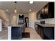 Modern kitchen with island and stainless steel appliances at 30755 Summer Sun Loop, Wesley Chapel, FL 33545