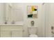 Clean bathroom with white vanity, toilet and shower at 31819 Cardinal Yard Dr, San Antonio, FL 33576