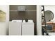 Bright laundry room with washer and dryer included at 32058 Spiceberry St, San Antonio, FL 33576