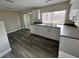 Modern kitchen featuring new cabinets and countertops at 3341 Wiltshire Dr, Holiday, FL 34691