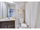 Simple bathroom with single vanity, toilet and shower at 35474 Quartz Lake Dr, Zephyrhills, FL 33541