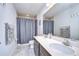 Clean bathroom with double sinks and shower/tub combo at 35474 Quartz Lake Dr, Zephyrhills, FL 33541