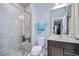 Clean bathroom with a walk-in shower and modern vanity at 35474 Quartz Lake Dr, Zephyrhills, FL 33541