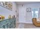 Bright entryway with decorative console table and seating area at 35474 Quartz Lake Dr, Zephyrhills, FL 33541