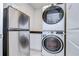 Convenient laundry room with a full-size washer and dryer at 35474 Quartz Lake Dr, Zephyrhills, FL 33541