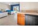 Bright bedroom with kitchenette and stylish herringbone-patterned flooring at 3702 El Centro St, St Pete Beach, FL 33706