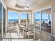 Bright breakfast nook with ocean views and seating for six at 3702 El Centro St, St Pete Beach, FL 33706