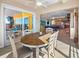 Casual dining area with ocean views and access to patio at 3702 El Centro St, St Pete Beach, FL 33706