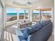 Relaxing living room with ocean views and comfy sofa at 3702 El Centro St, St Pete Beach, FL 33706