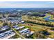 Aerial view showing home's location near golf course at 3717 Trophy Blvd, New Port Richey, FL 34655