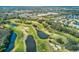 Aerial view of community near golf course at 3717 Trophy Blvd, New Port Richey, FL 34655